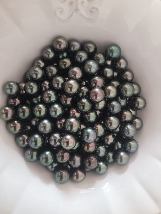 Perles de Tahiti 11-12 mm de qualité AA, multicolores foncées et de forme ronde très brillante