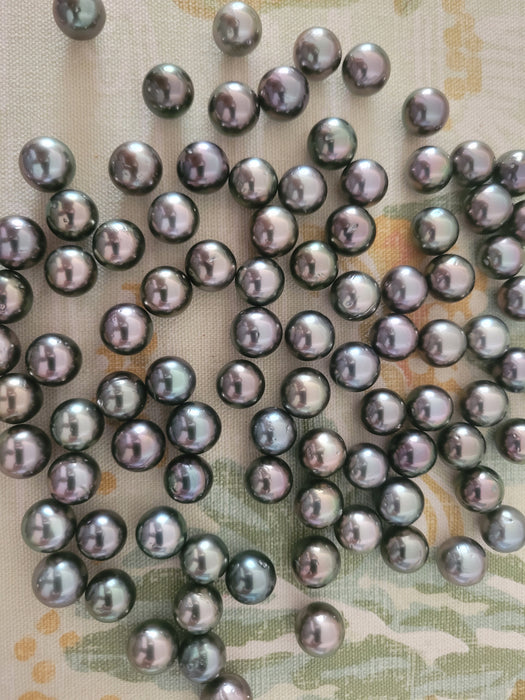 Perles de Tahiti en vrac 11-12 mm qualité AA couleur cerise et lustre élevé