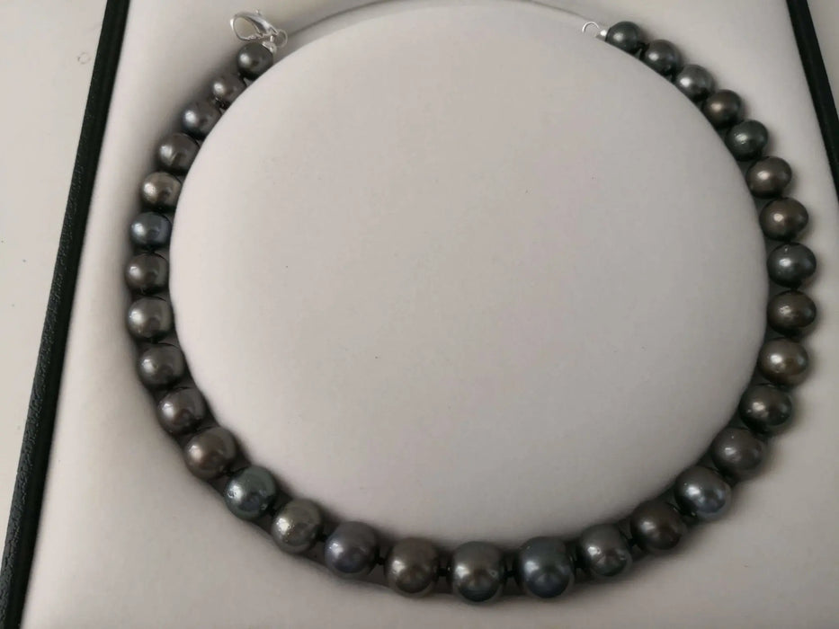 Tahiti Pearls 11-13 mm Round dark natural color and luster - Only at  The South Sea Pearl