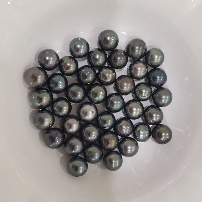 Tahiti Pearls 12-13 mm Dark Color, Very High Luster, Semi-Round |  The South Sea Pearl |  The South Sea Pearl