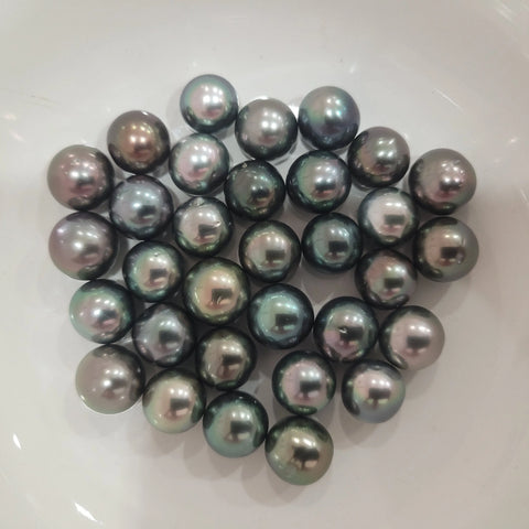 Loose dark Tahitian cultured pearls 10-11mm round (Pinctada margaritifera) — The South Sea Pearl