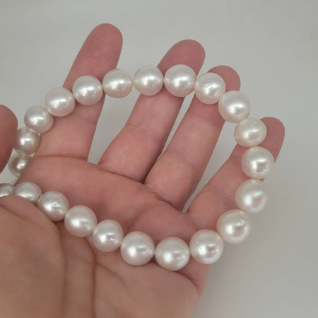 Cultured South Sea pearl necklace 10-13mm on model — 18K gold