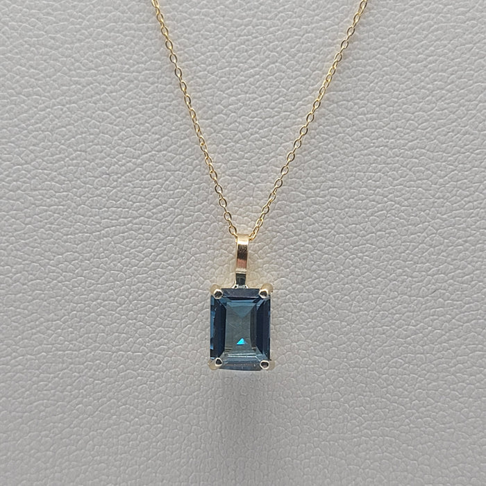 Elegant London Blue Topaz Pendant in 18K Yellow Gold with Adjustable Gold Chain - MIMUKA