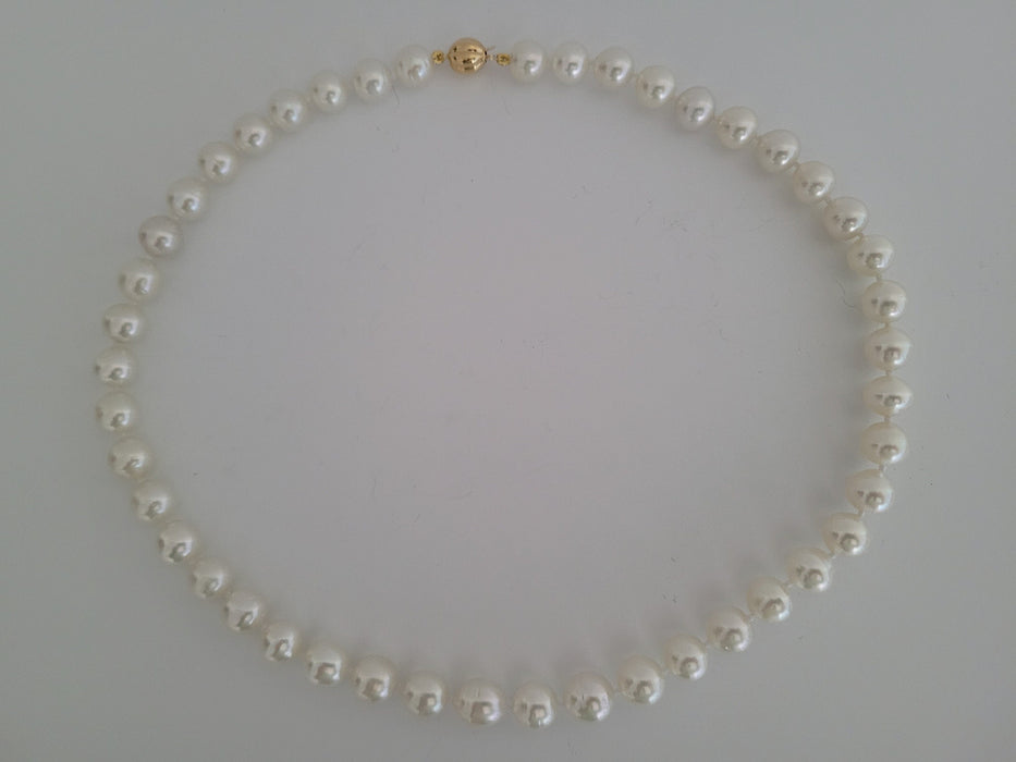 White South Sea Pearls Necklace 9-10 mm White Natural Color and High Luster, 18 Karat Solid Yellow Gold Clasp The South Sea Pearl