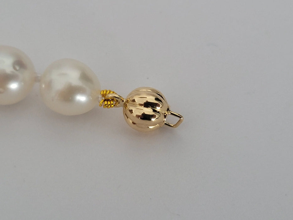A Bracelet of White South Sea Pearls and 18 karat Solid Gold - Only at  The South Sea Pearl