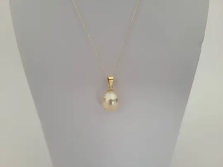 A Golden South Sea Pearl 14×12 Tear-Drop, High Luster, 18 Karat Solid Gold -  The South Sea Pearl