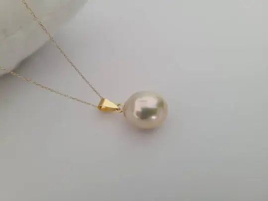 A Golden South Sea Pearl 14×12 Tear-Drop, High Luster, 18 Karat Solid Gold -  The South Sea Pearl