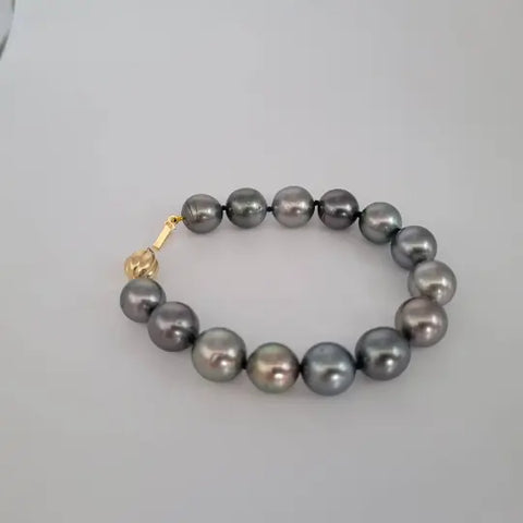 Dark Tahitian cultured pearl bracelet 10-11mm semi-round in 18K Gold (Pinctada margaritifera) — The South Sea Pearl