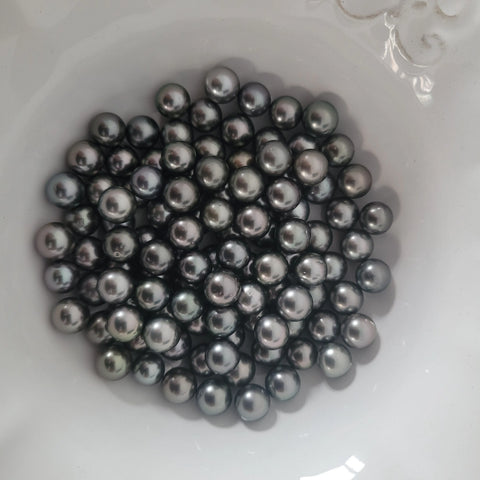 Dark Tahitian loose pearl 9-10mm round (Pinctada margaritifera)