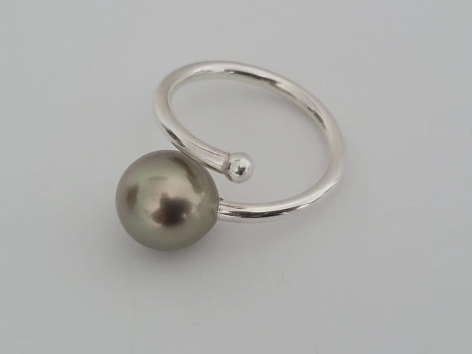 Tahiti Pearl Peacock Color 9.80 mm Round AAA quality - Only at  The South Sea Pearl