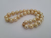 Deep Golden South Sea Pearls 11-13.80 mm Round Shape - Only at  The South Sea Pearl