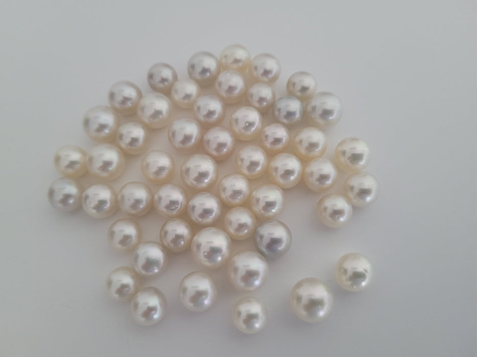 Wholesale Lot White Loose South Sea Pearls 9-11 mm Round, High luster, 50 pcs - Only at  The South Sea Pearl